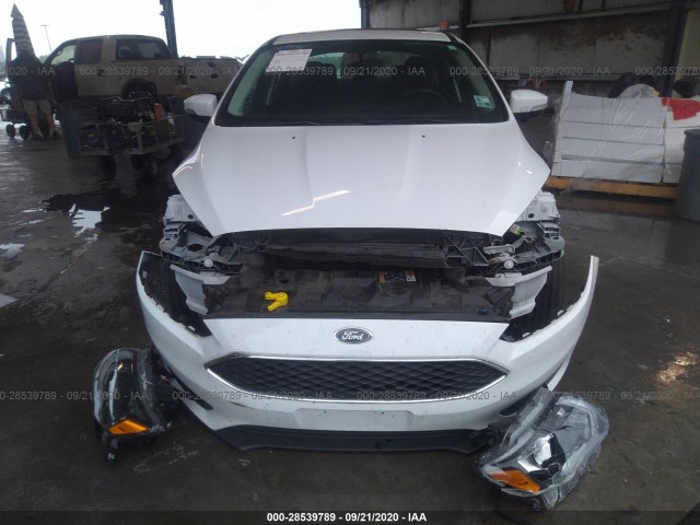 Photo 5 VIN: 1FADP3H27HL225598 - FORD FOCUS 