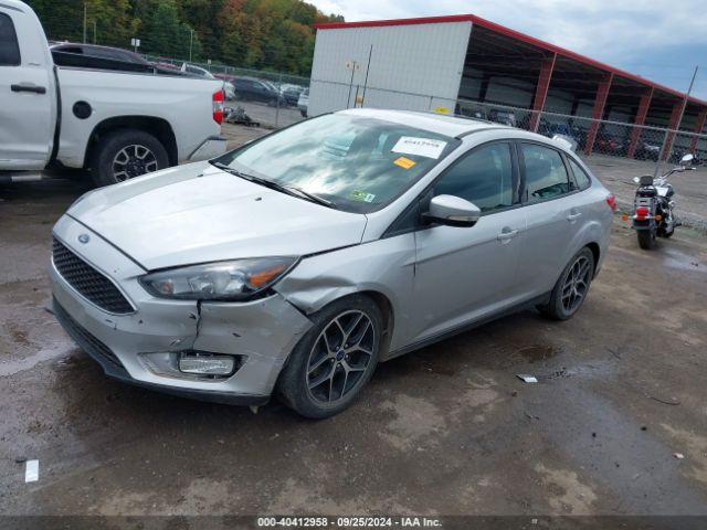 Photo 1 VIN: 1FADP3H27HL318136 - FORD FOCUS 