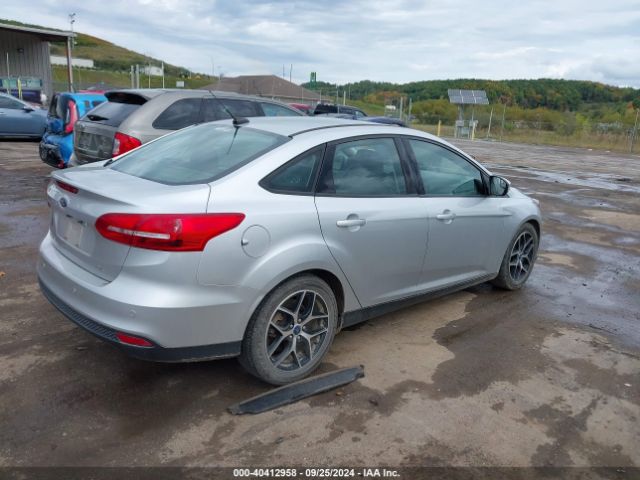 Photo 3 VIN: 1FADP3H27HL318136 - FORD FOCUS 