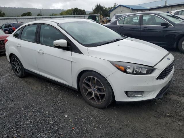 Photo 3 VIN: 1FADP3H27HL323028 - FORD FOCUS 