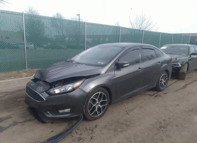 Photo 1 VIN: 1FADP3H27JL208340 - FORD FOCUS 