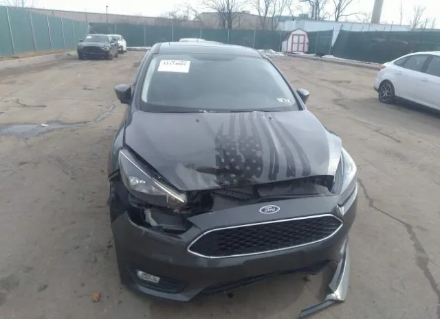 Photo 5 VIN: 1FADP3H27JL208340 - FORD FOCUS 