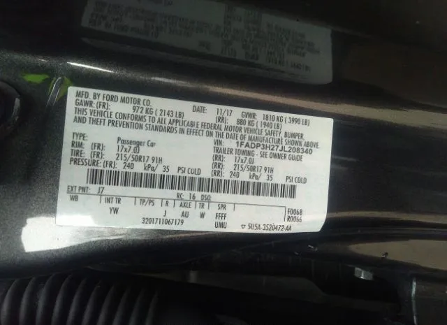 Photo 8 VIN: 1FADP3H27JL208340 - FORD FOCUS 