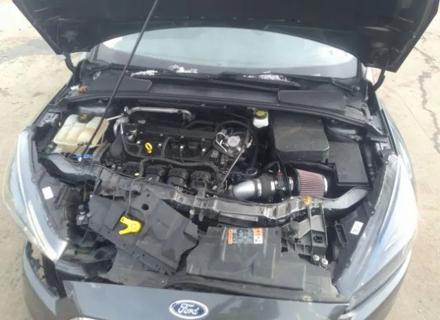 Photo 9 VIN: 1FADP3H27JL208340 - FORD FOCUS 