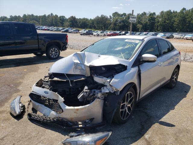 Photo 1 VIN: 1FADP3H27JL242990 - FORD FOCUS SEL 