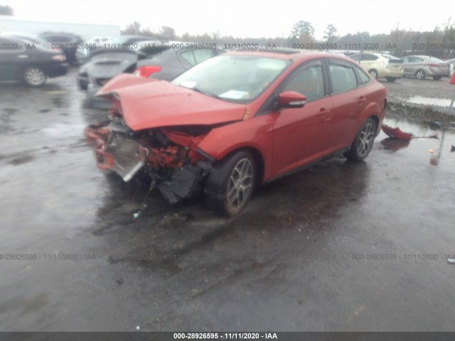 Photo 1 VIN: 1FADP3H27JL256890 - FORD FOCUS 