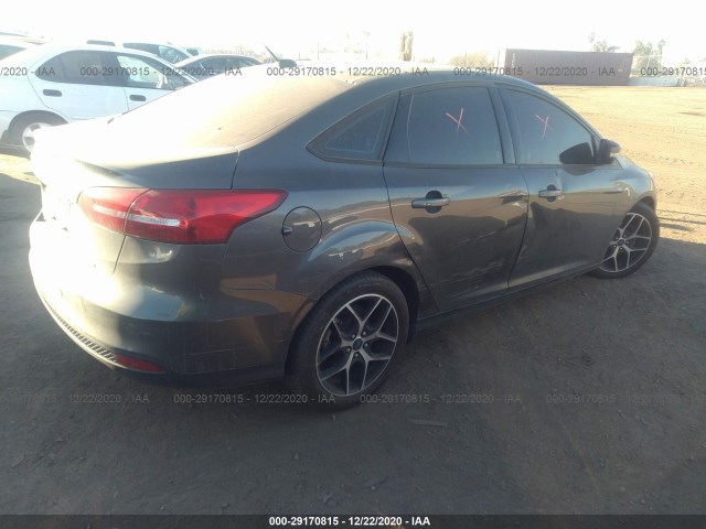 Photo 3 VIN: 1FADP3H27JL260941 - FORD FOCUS 