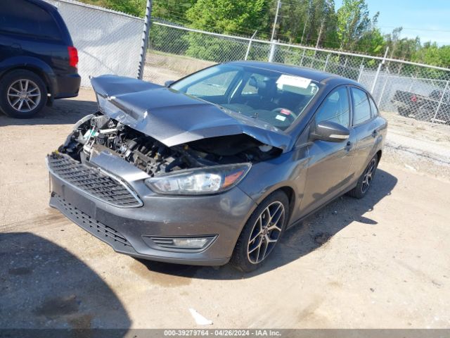 Photo 1 VIN: 1FADP3H27JL319311 - FORD FOCUS 