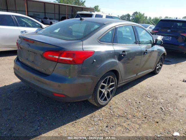 Photo 3 VIN: 1FADP3H27JL319311 - FORD FOCUS 