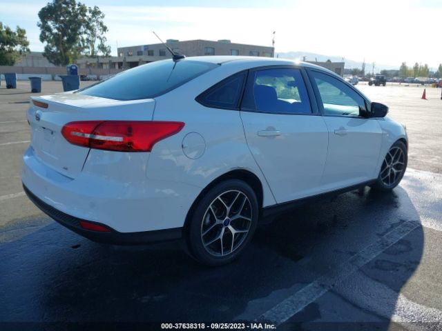 Photo 3 VIN: 1FADP3H28HL247237 - FORD FOCUS 