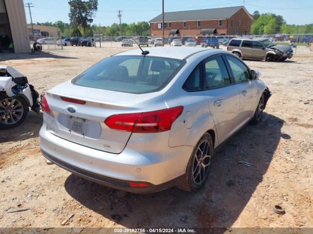 Photo 3 VIN: 1FADP3H28HL259999 - FORD FOCUS 