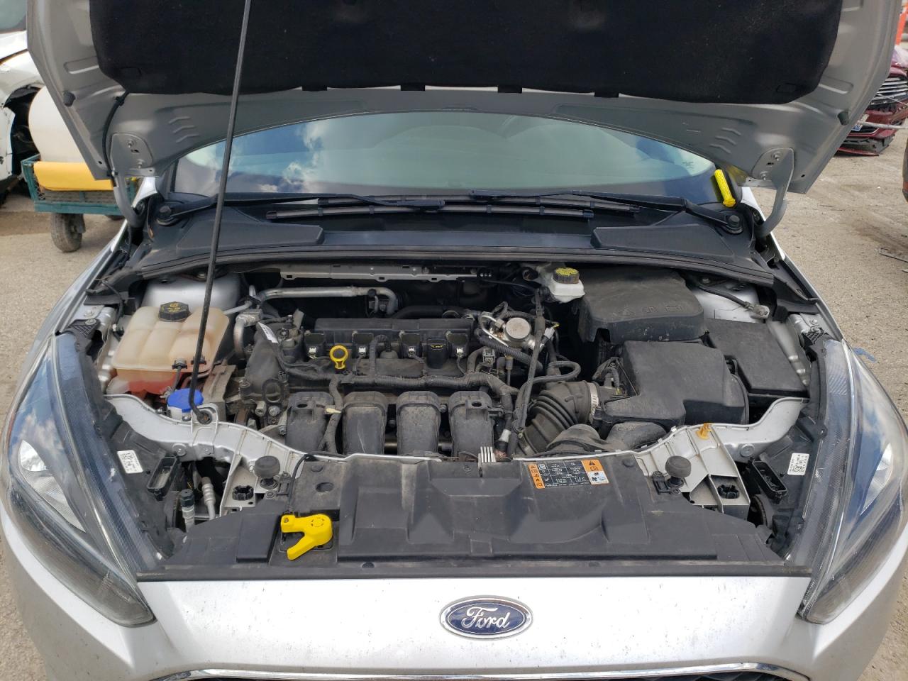 Photo 10 VIN: 1FADP3H28JL282057 - FORD FOCUS 