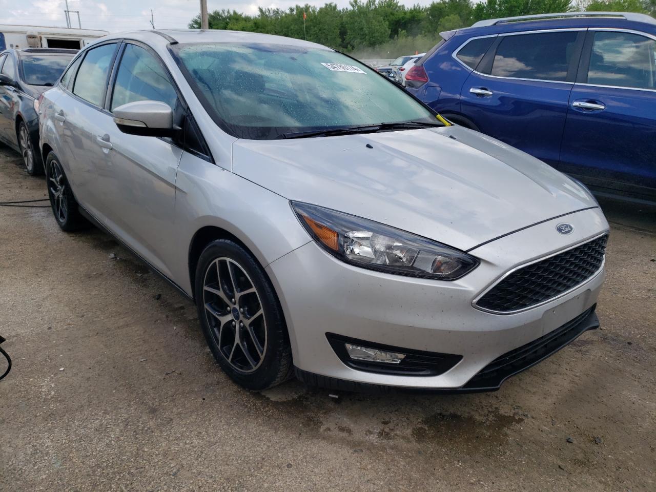 Photo 3 VIN: 1FADP3H28JL282057 - FORD FOCUS 