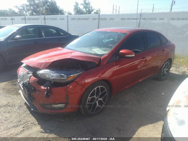 Photo 1 VIN: 1FADP3H28JL288148 - FORD FOCUS 