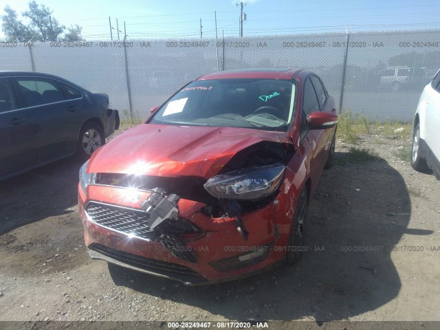 Photo 5 VIN: 1FADP3H28JL288148 - FORD FOCUS 