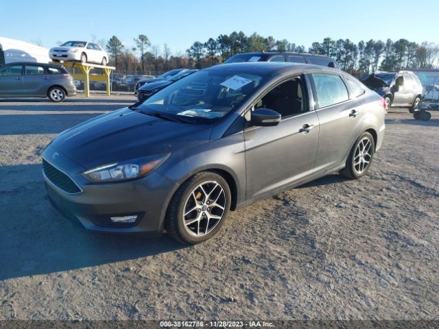 Photo 1 VIN: 1FADP3H28JL312738 - FORD FOCUS 