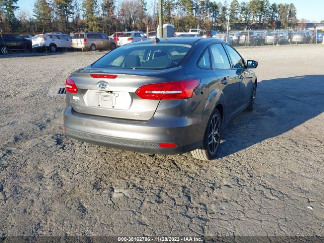 Photo 3 VIN: 1FADP3H28JL312738 - FORD FOCUS 