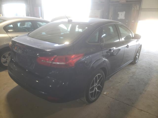 Photo 3 VIN: 1FADP3H2XHL313108 - FORD FOCUS SEL 