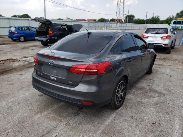 Photo 3 VIN: 1FADP3H2XHL323301 - FORD FOCUS SEL 