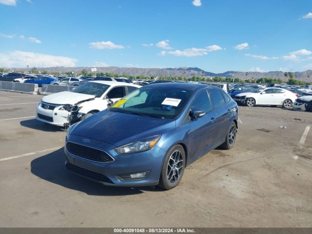 Photo 1 VIN: 1FADP3H2XJL217517 - FORD FOCUS 