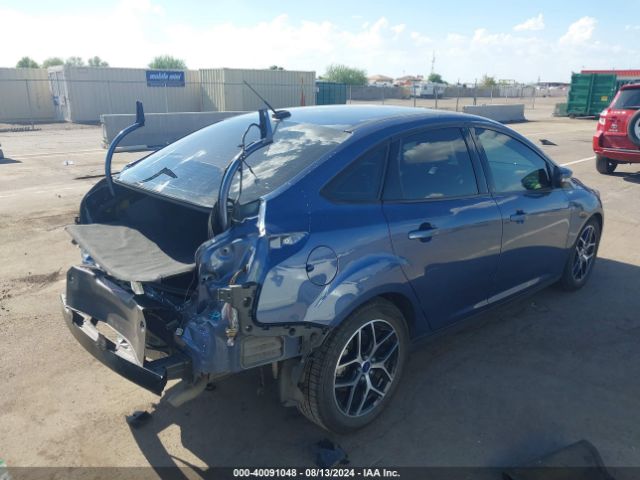 Photo 3 VIN: 1FADP3H2XJL217517 - FORD FOCUS 