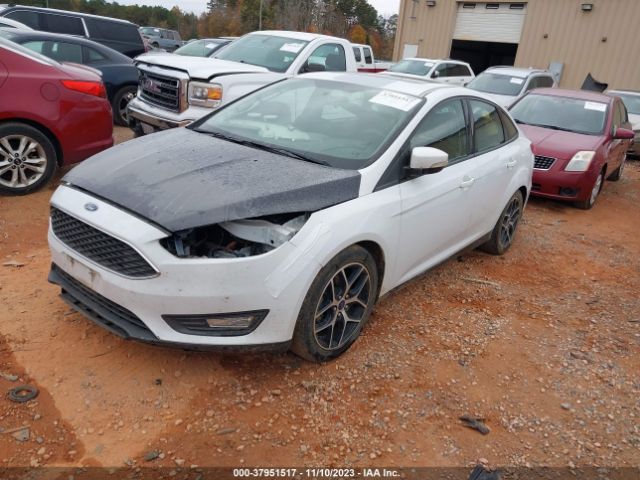 Photo 1 VIN: 1FADP3H2XJL220255 - FORD FOCUS 