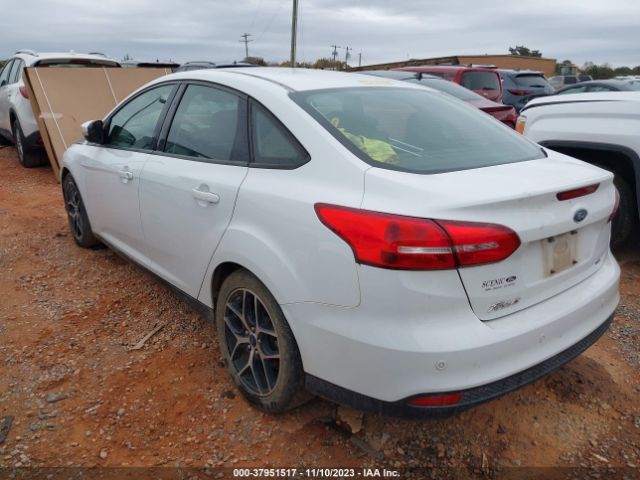 Photo 2 VIN: 1FADP3H2XJL220255 - FORD FOCUS 