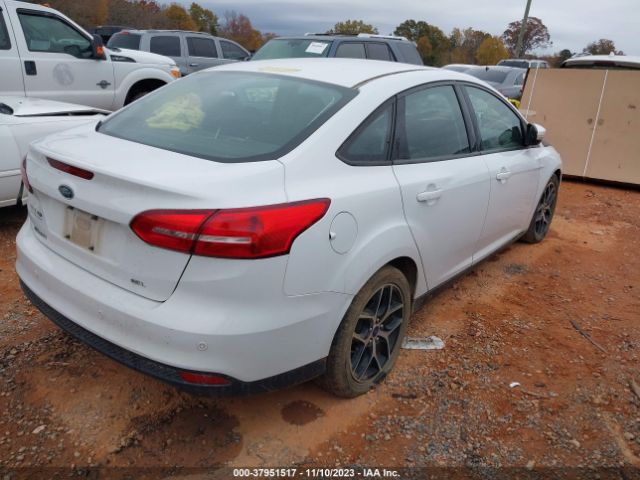 Photo 3 VIN: 1FADP3H2XJL220255 - FORD FOCUS 