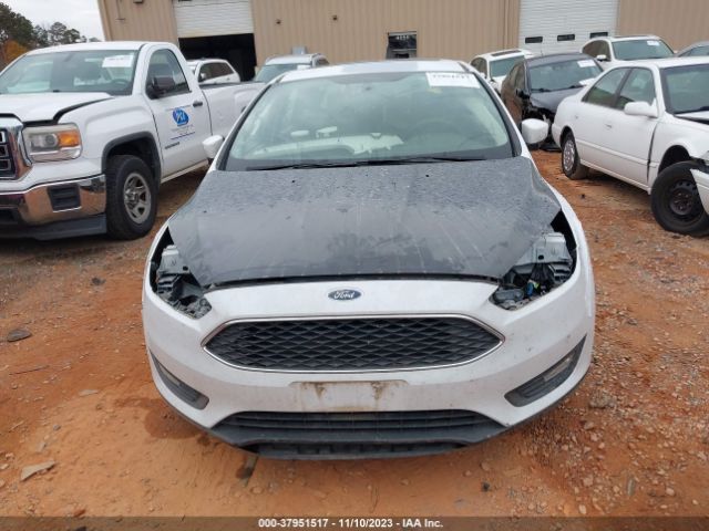 Photo 5 VIN: 1FADP3H2XJL220255 - FORD FOCUS 