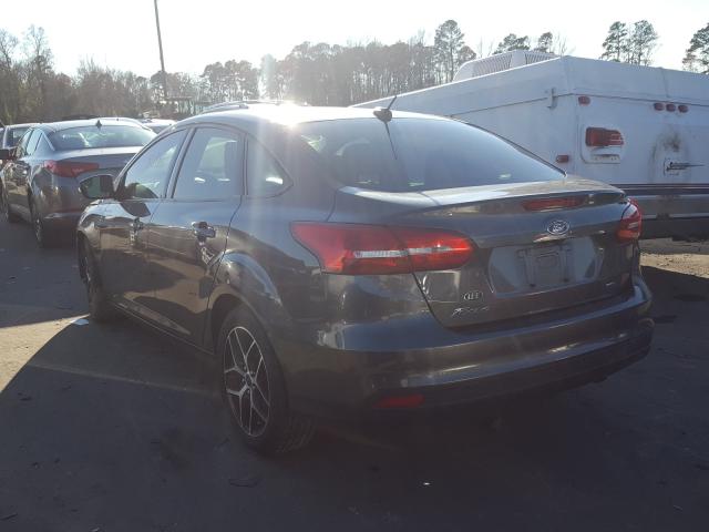 Photo 2 VIN: 1FADP3H2XJL226587 - FORD FOCUS 