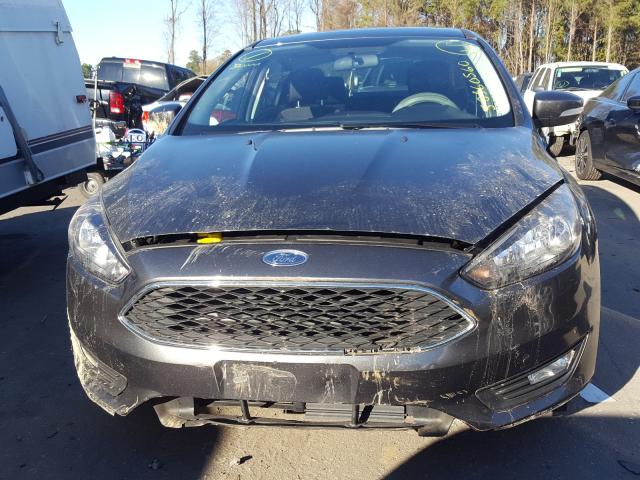 Photo 8 VIN: 1FADP3H2XJL226587 - FORD FOCUS 