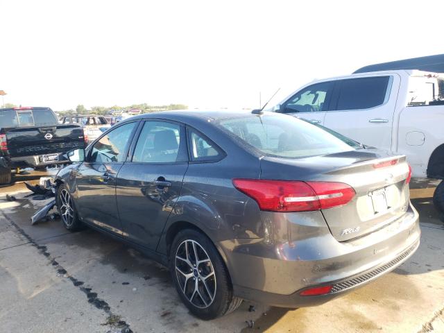 Photo 2 VIN: 1FADP3H2XJL263879 - FORD FOCUS 