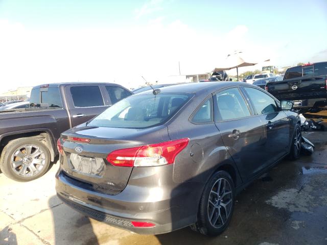 Photo 3 VIN: 1FADP3H2XJL263879 - FORD FOCUS 