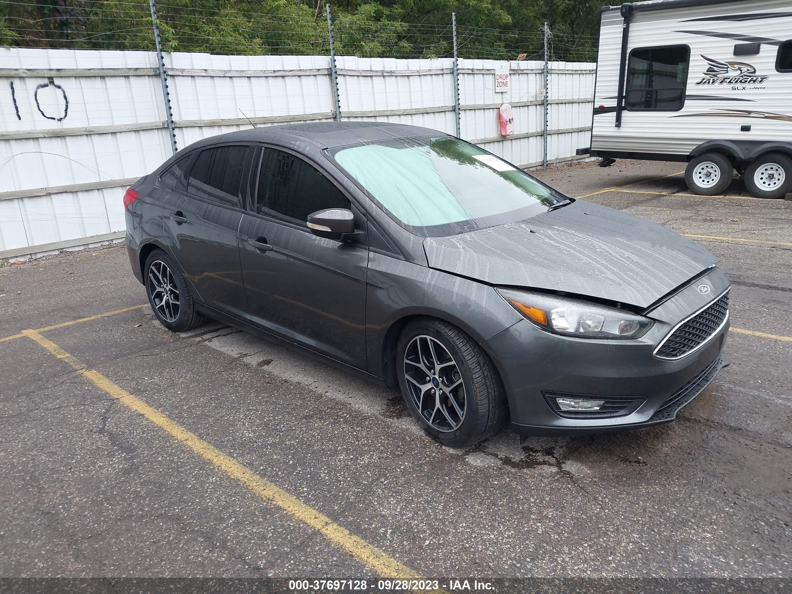 Photo 0 VIN: 1FADP3H2XJL311056 - FORD FOCUS 