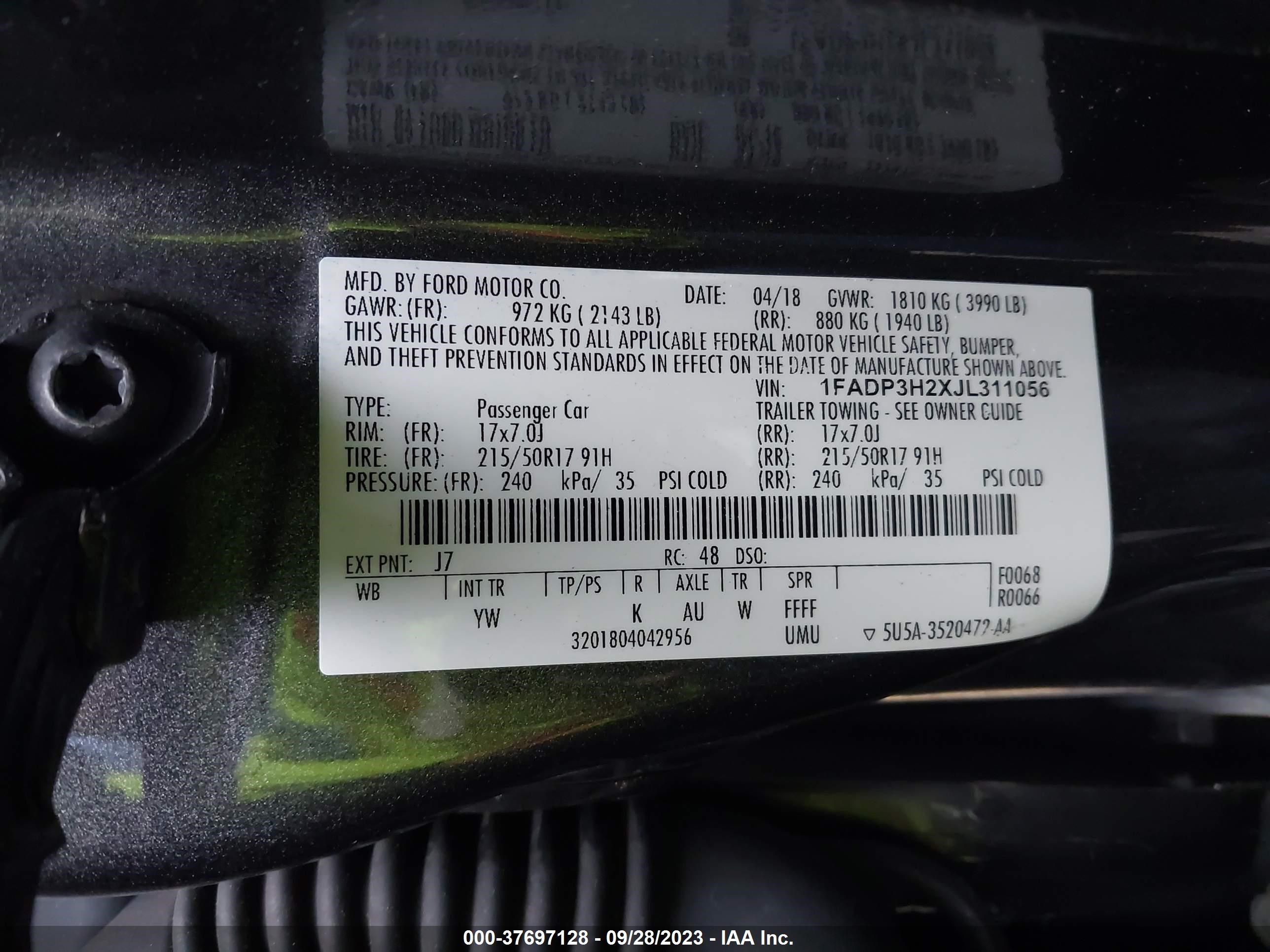 Photo 8 VIN: 1FADP3H2XJL311056 - FORD FOCUS 