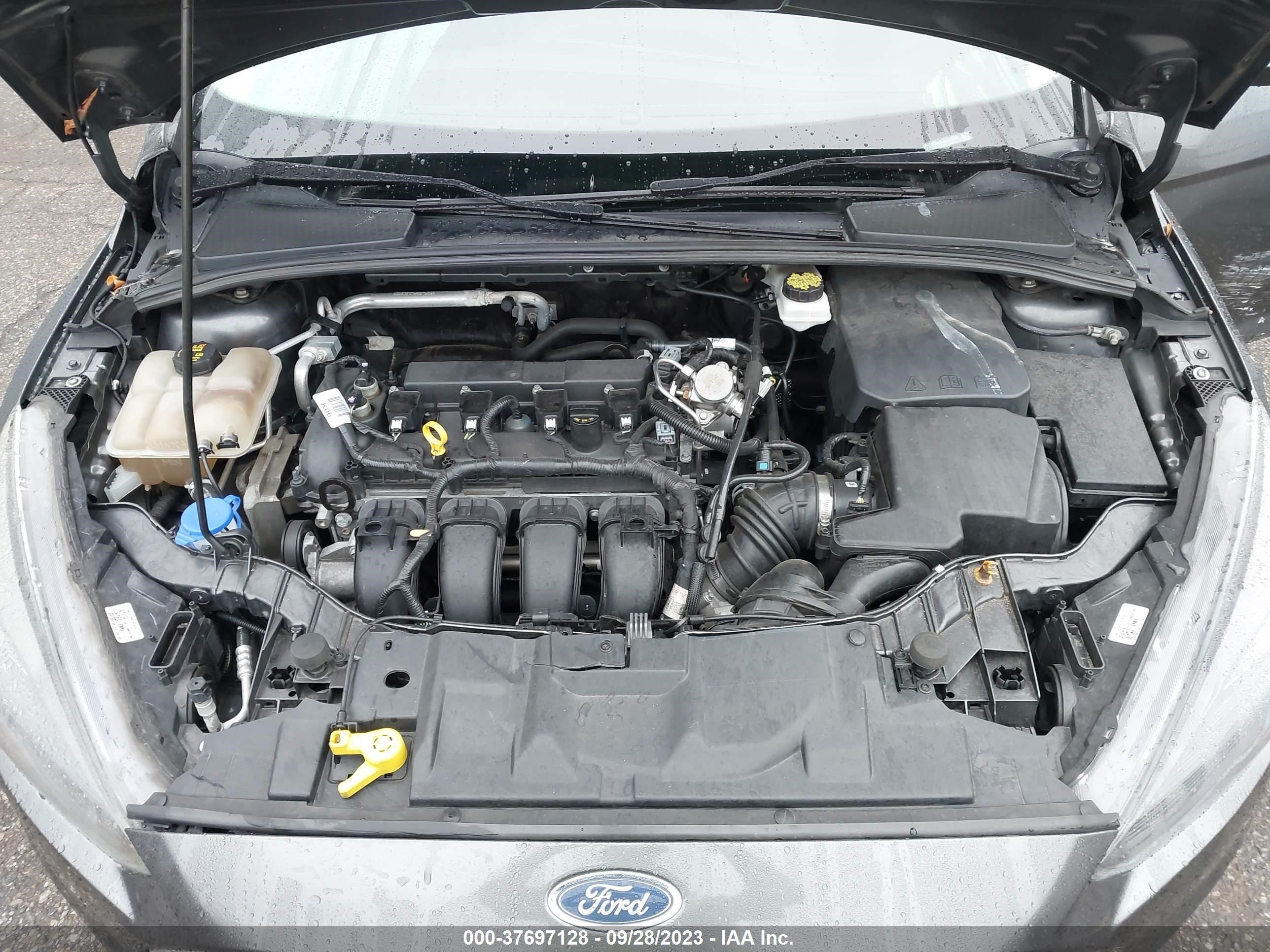 Photo 9 VIN: 1FADP3H2XJL311056 - FORD FOCUS 