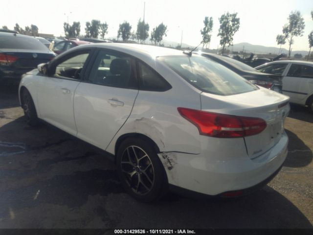 Photo 2 VIN: 1FADP3H2XJL322848 - FORD FOCUS 