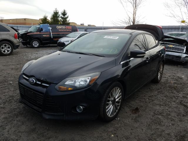 Photo 1 VIN: 1FADP3J20DL100673 - FORD FOCUS TITA 