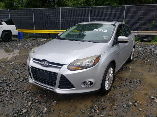 Photo 1 VIN: 1FADP3J20EL180798 - FORD FOCUS TITA 