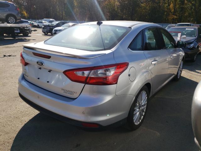 Photo 3 VIN: 1FADP3J20EL180798 - FORD FOCUS TITA 