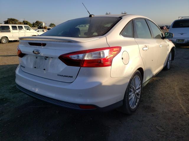 Photo 3 VIN: 1FADP3J20EL230177 - FORD FOCUS TITA 