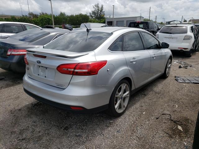 Photo 3 VIN: 1FADP3J20GL201314 - FORD FOCUS 