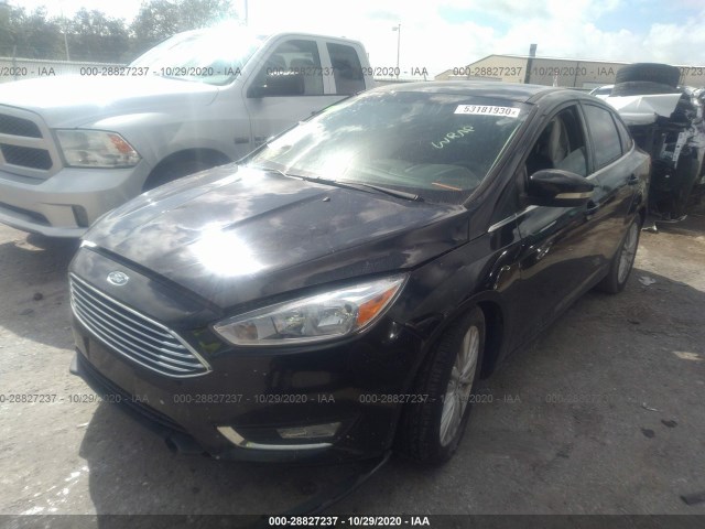 Photo 1 VIN: 1FADP3J20GL242090 - FORD FOCUS 