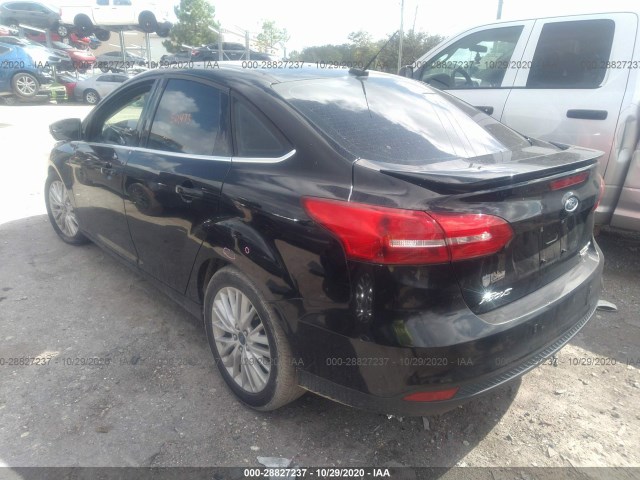 Photo 2 VIN: 1FADP3J20GL242090 - FORD FOCUS 