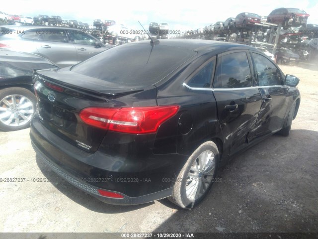 Photo 3 VIN: 1FADP3J20GL242090 - FORD FOCUS 