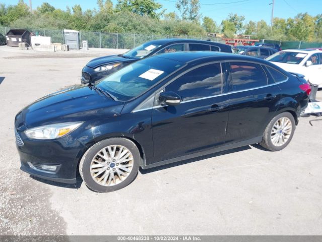 Photo 1 VIN: 1FADP3J20GL243689 - FORD FOCUS 