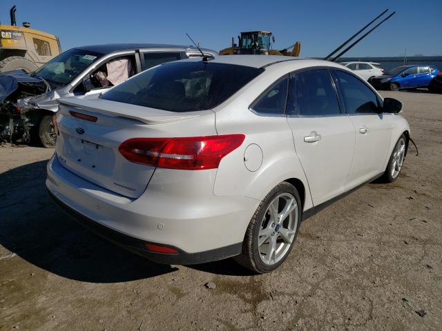 Photo 3 VIN: 1FADP3J20GL253414 - FORD FOCUS 