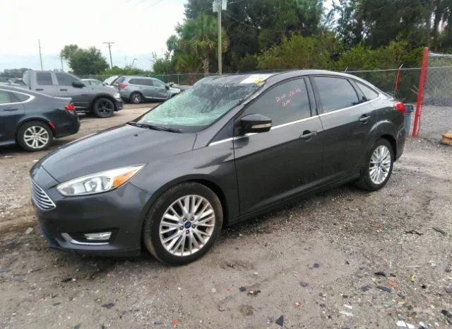 Photo 1 VIN: 1FADP3J21HL322919 - FORD FOCUS 