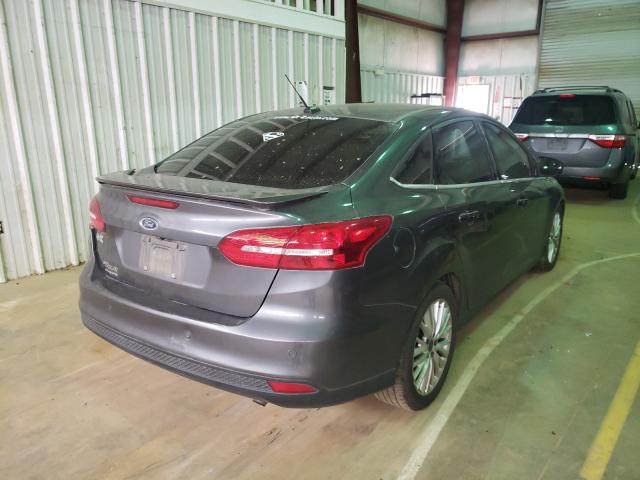 Photo 3 VIN: 1FADP3J22FL374394 - FORD FOCUS TITA 