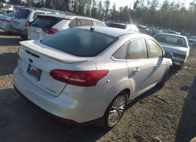 Photo 3 VIN: 1FADP3J22JL224472 - FORD FOCUS 